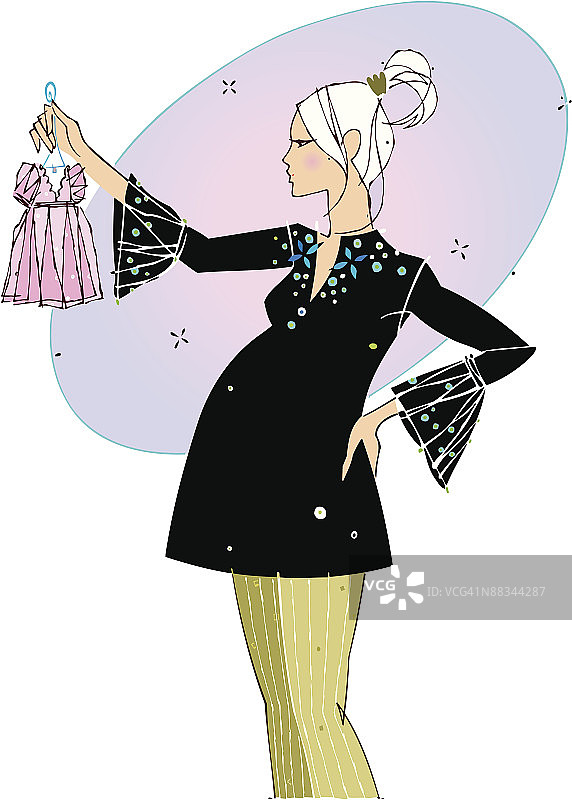 孕妇看婴儿服装，彩色照片图片素材