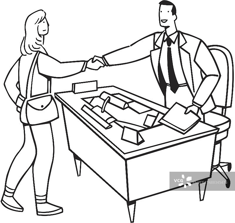 办公桌后与女人握手的男人图片素材