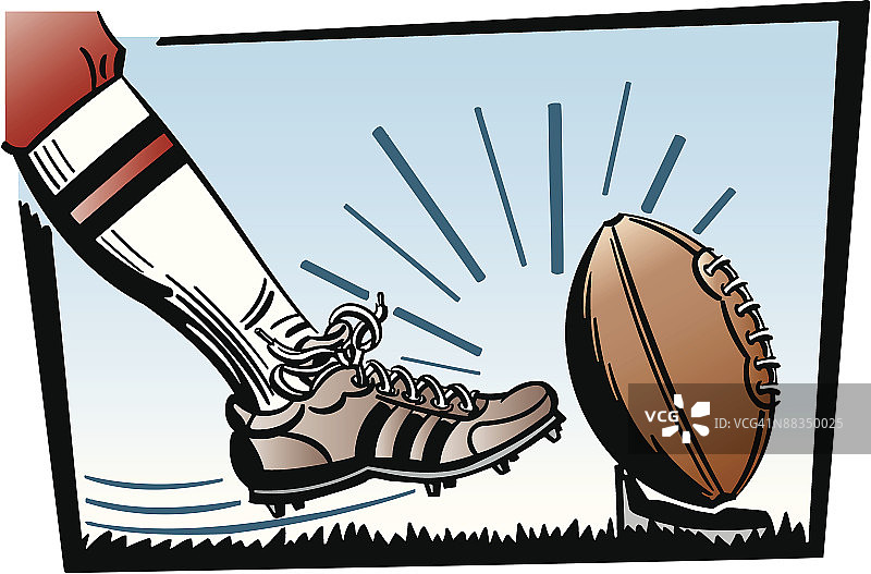 穿钉鞋的脚踢足球的特写图片素材