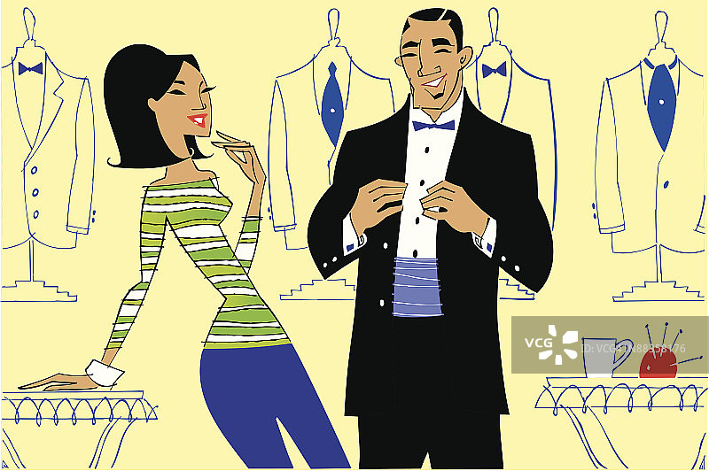 一对男女在男人试穿礼服时大笑图片素材