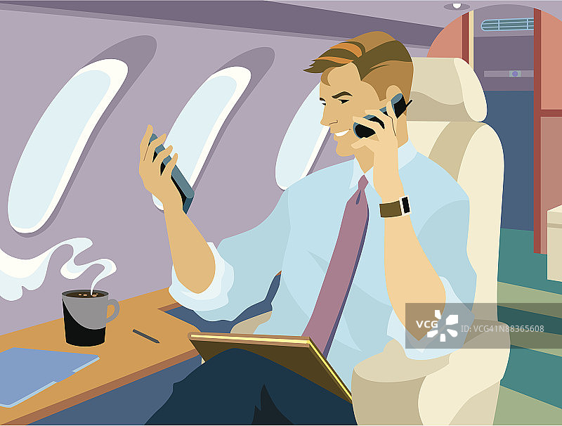 在公务机上使用笔记本电脑和手机的商人图片素材