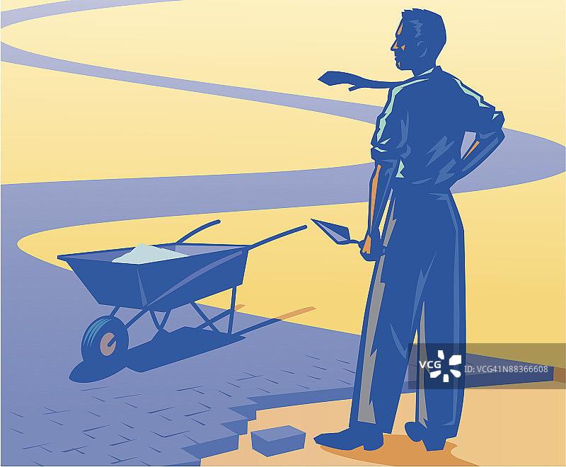 铺设砖路的商人图片素材