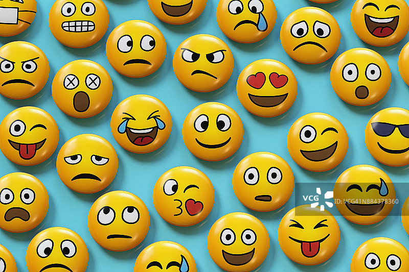 蓝色背景上的表情符号徽章图片素材