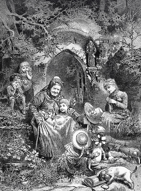 童话世界里的故事：孩子们在奶奶身边聆听图片素材