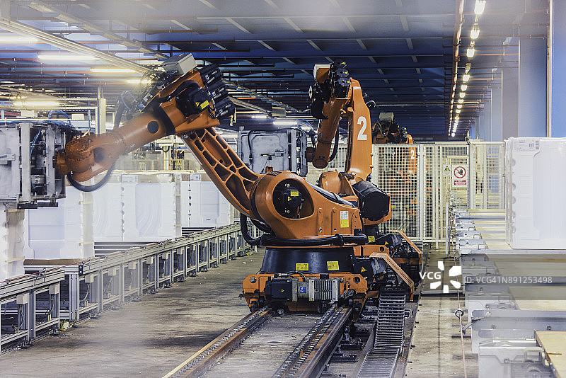 机械臂操作家用电器图片素材