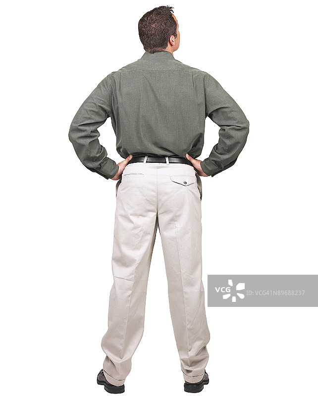 双手叉腰站立的年轻男子背影图片素材