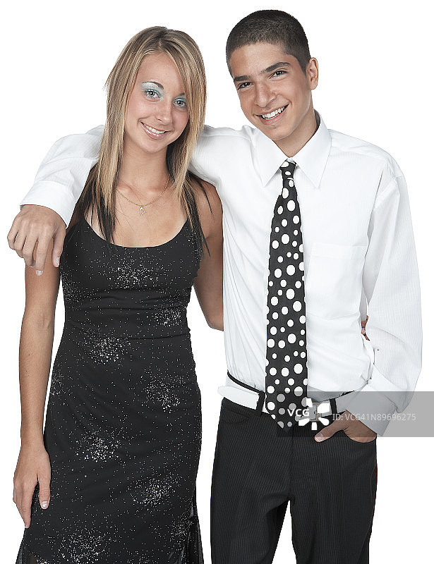 为相机摆姿势的青少年情侣图片素材