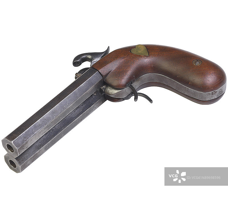 带黄铜心的古董木制手枪图片素材