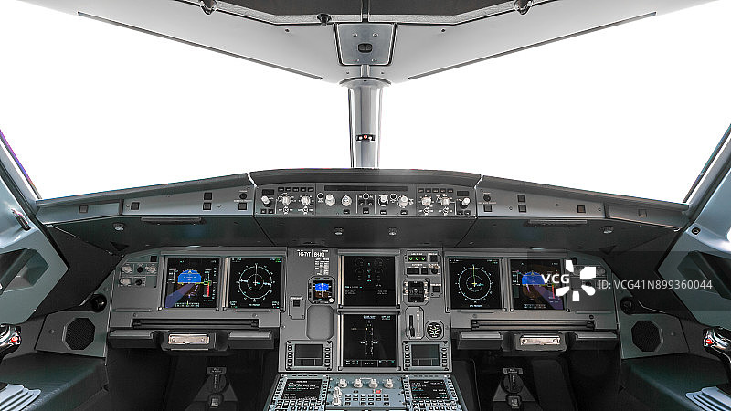 大型商用飞机驾驶舱的景色，驾驶舱训练器。商用飞机巡航的驾驶舱视野。飞机驾驶舱内的控制面板图片素材