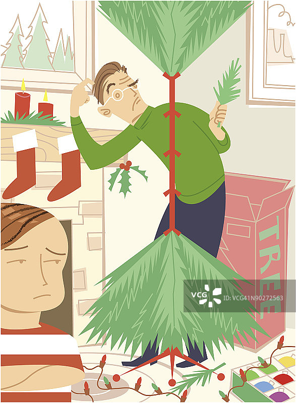 一对夫妇在圣诞树旁图片素材