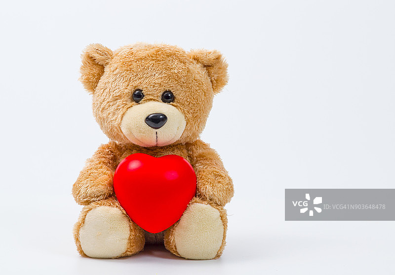 情人节主题：相拥的情侣泰迪熊，手工制作的红心、丝带和蝴蝶结，复古浪漫风格木质创意贺卡，适合家庭、婚礼和友谊图片素材