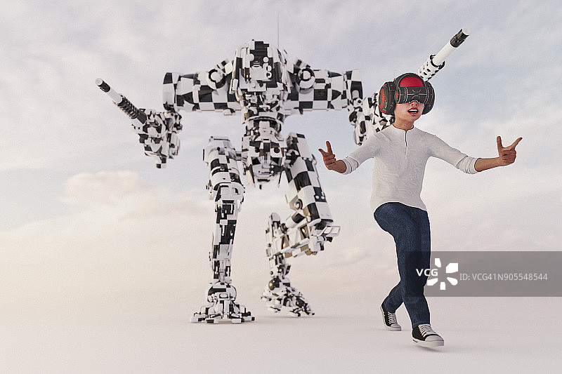 戴VR眼镜模仿机器人战士的男孩图片素材