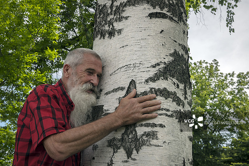 在俄罗斯下诺夫哥罗德旅行的白胡子年长男人肖像图片素材