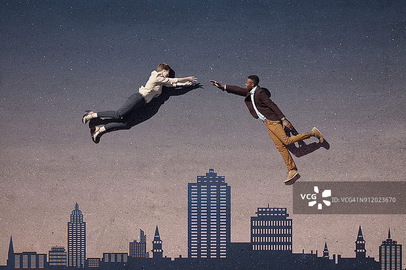 躺在绘有天际线沥青路面上互相伸出援手的商人图片素材