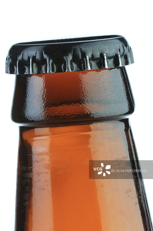 啤酒瓶和瓶盖特写图片素材