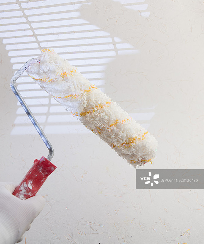 绘画滚筒和油漆工手套图片素材