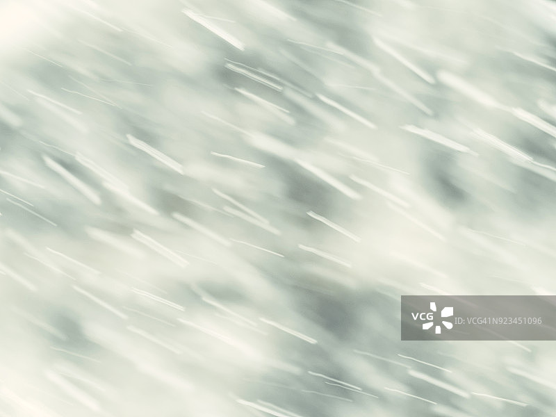 浅蓝色雪花飘落背景，西班牙图片素材