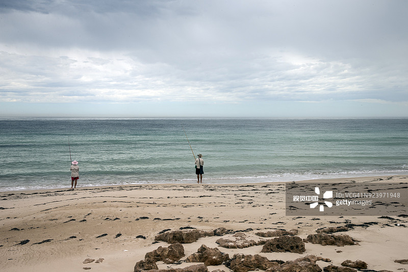 海滩钓鱼图片素材