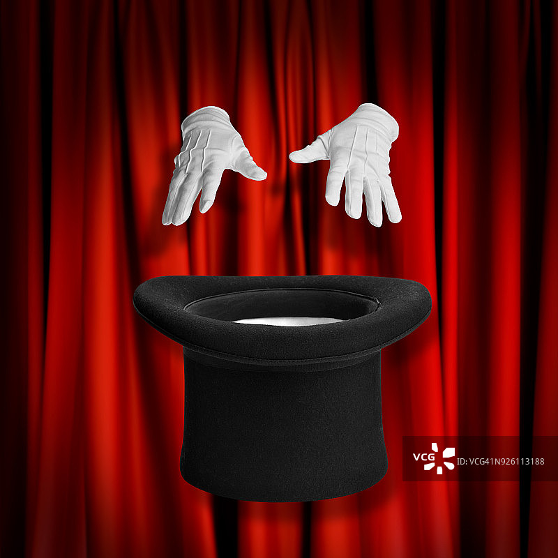 魔术师的手和高顶礼帽图片素材