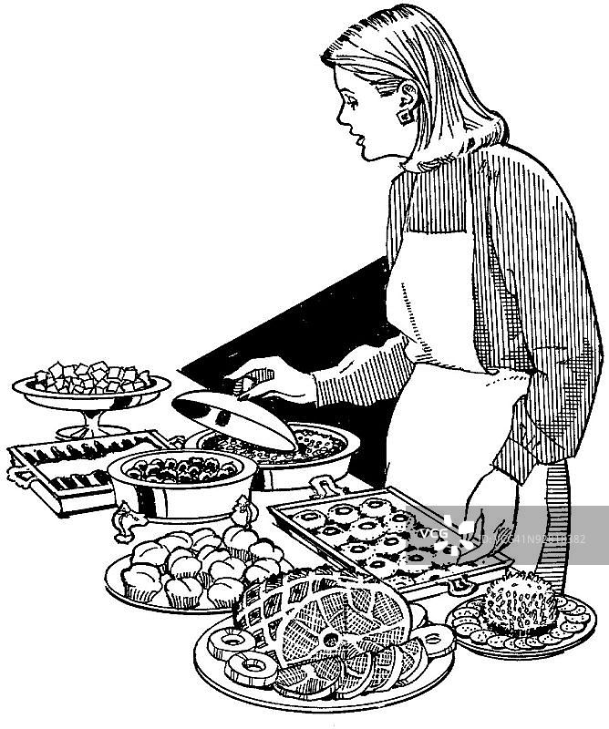 女人准备宴会餐桌图片素材