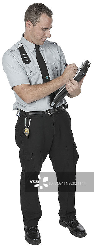 保安在剪贴板上书写图片素材