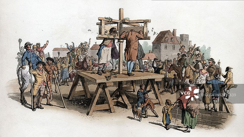 人群嘲笑枷锁中的男人图片素材