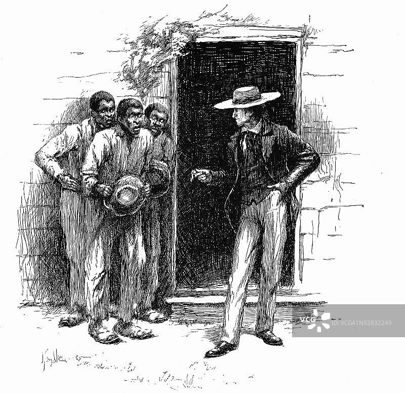 种植园主向奴隶展示巫毒魅力图片素材