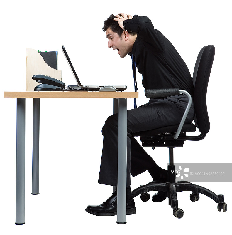 商人正在使用笔记本电脑工作图片素材