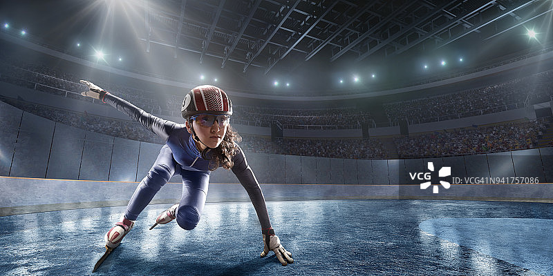 在专业冰场滑行的女子短道速滑运动员图片素材