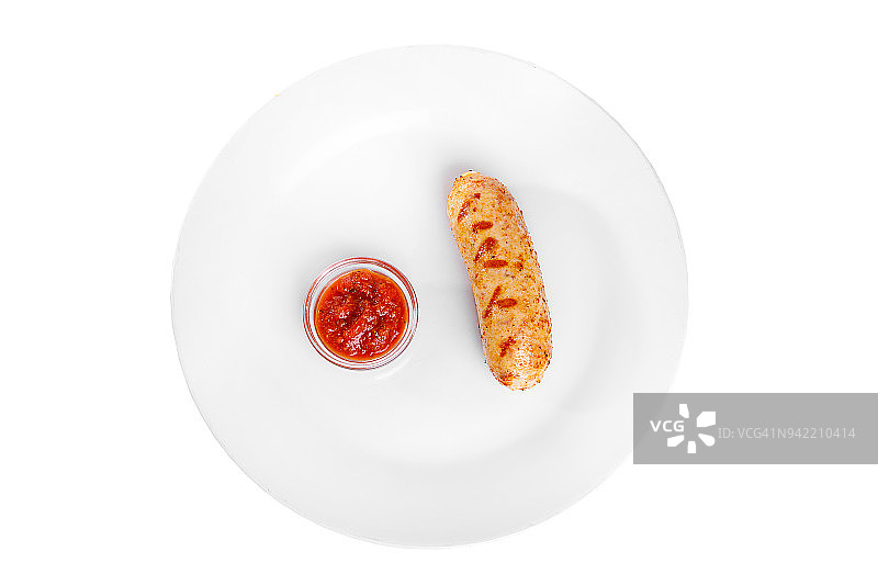 搭配番茄酱的猪肉香肠和鸡肉图片素材