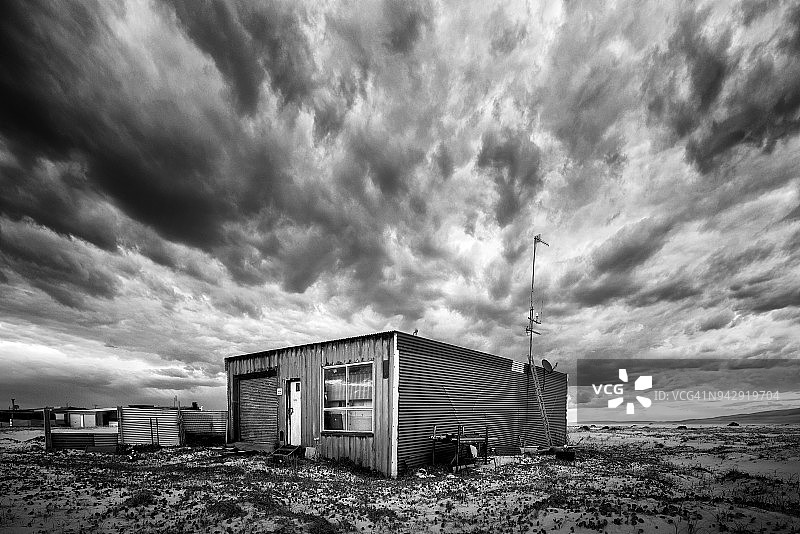 日落时斯托克顿海滩的锡城，斯蒂芬斯港，安娜湾，澳大利亚图片素材