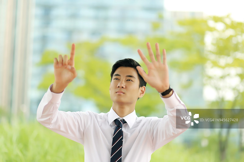 商人伸出手指和手掌图片素材