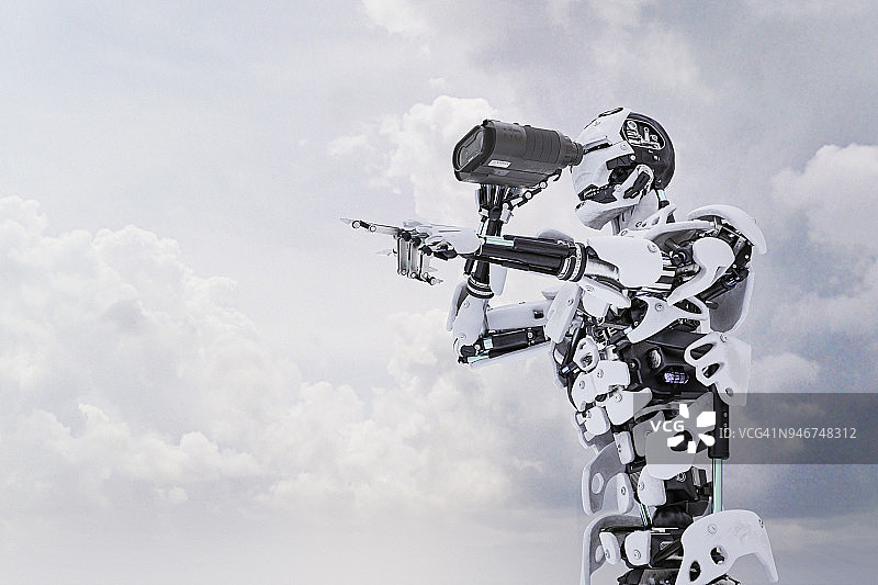 数字监控：带双筒望远镜的机器人正在观察和指向图片素材