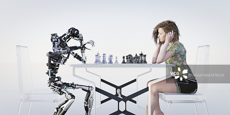 年轻少女和机器人下棋图片素材