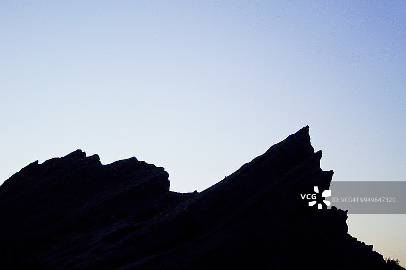日落时分的瓦斯奎兹巨岩剪影图片素材