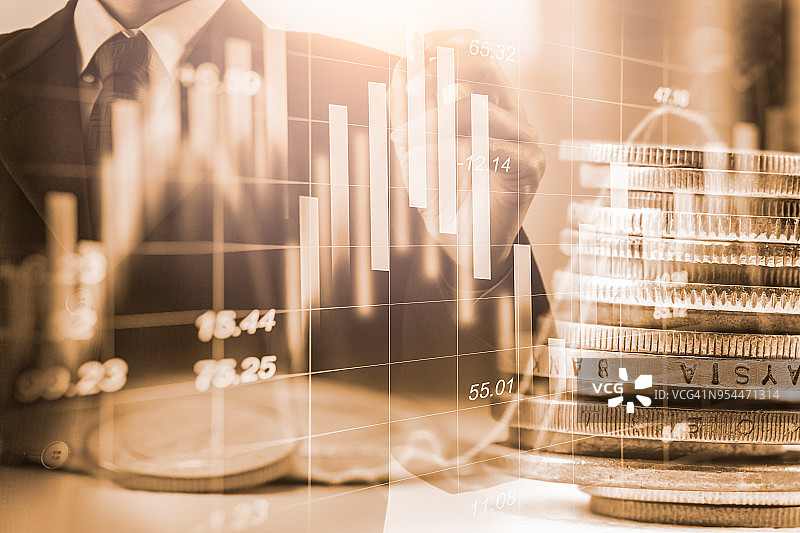股市金融交易指标背景下的商务男士图片素材