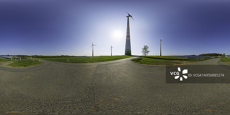 乡村风力涡轮机和太阳能电池板全景图片素材