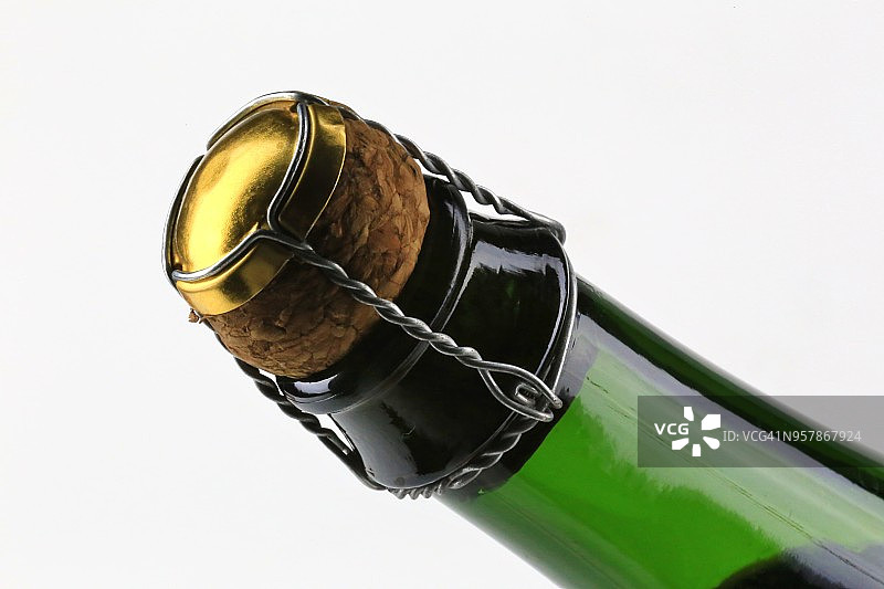 白色背景上的香槟酒瓶塞图片素材