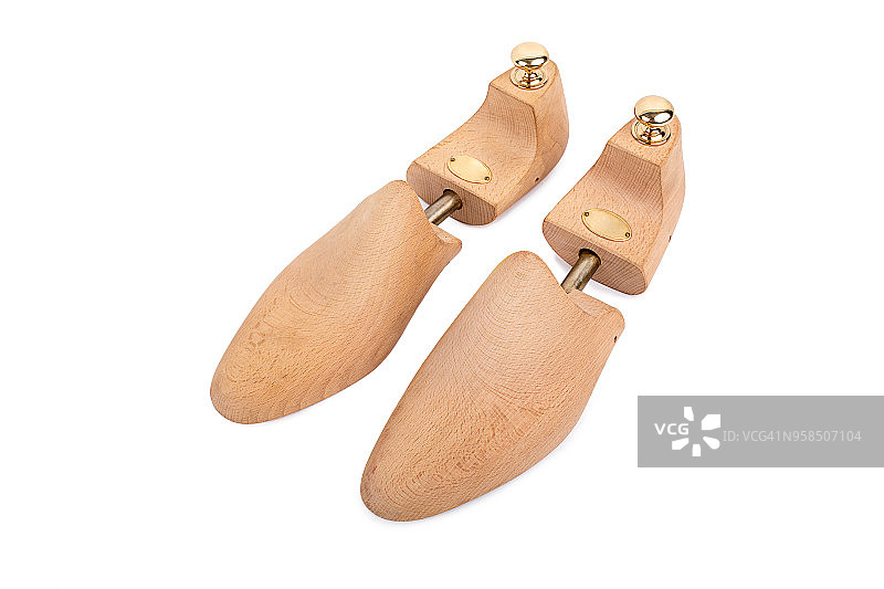 白色背景的奢华木制鞋撑图片素材