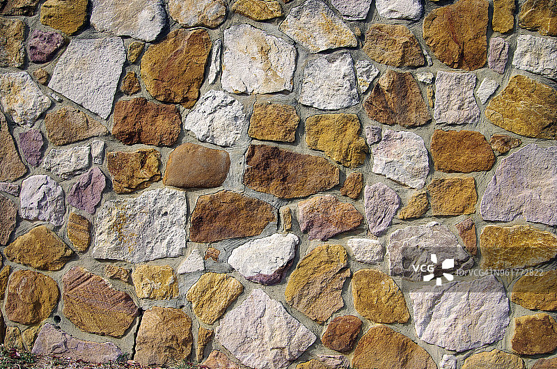 岩石和水泥砌成的石墙图片素材
