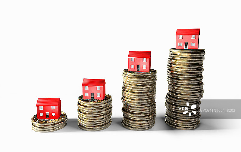 硬币图表顶部的房屋图片素材