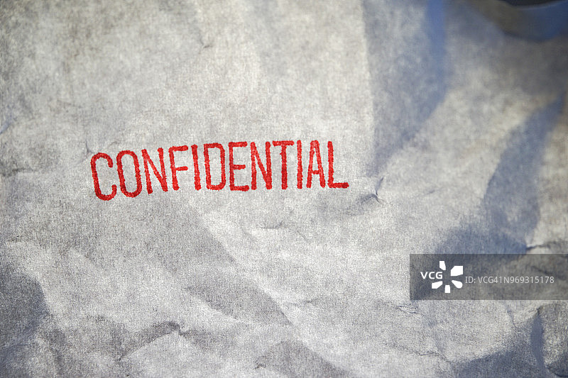 盖在纸上的“机密”字样图片素材