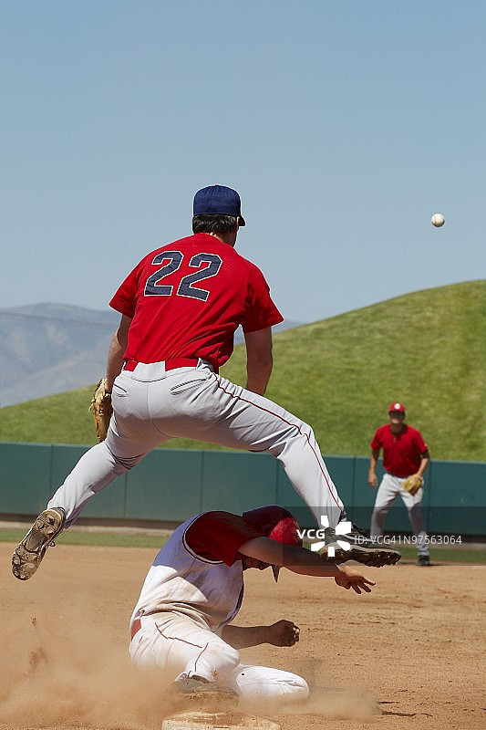 跑步者滑垒图片素材