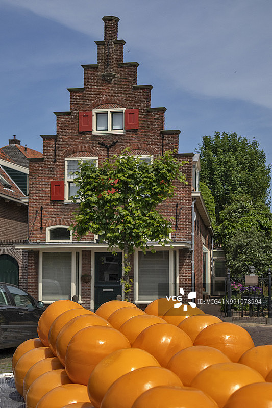 荷兰传统砖房和黄色奶酪图片素材