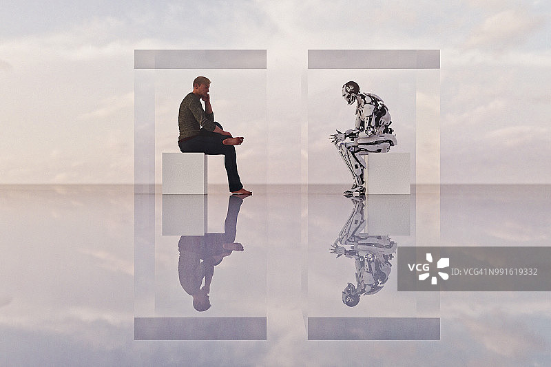 图灵测试：机器人与人类在立方体中相对而坐图片素材