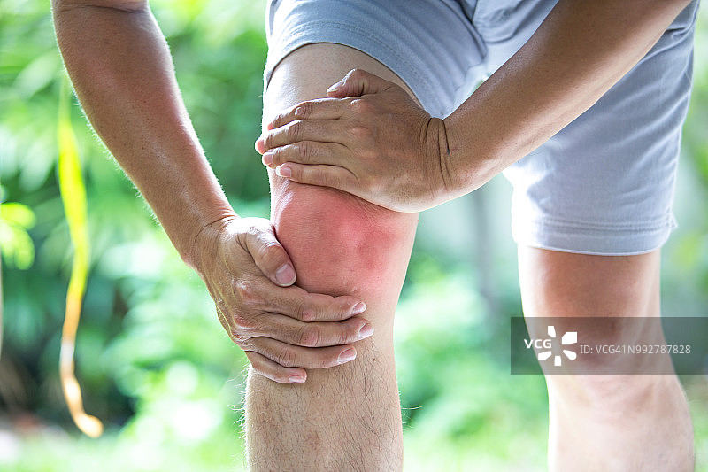 膝盖疼痛，商人膝盖痛图片素材