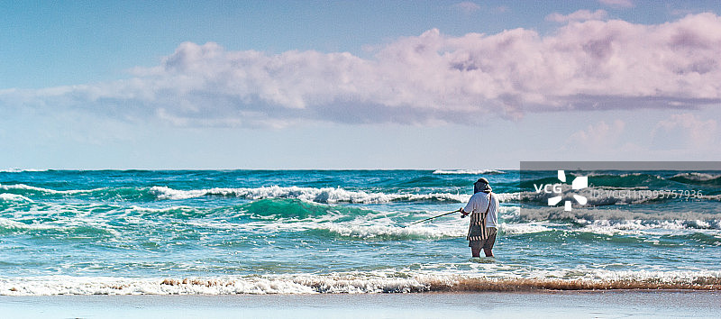 在海滩钓鱼图片素材