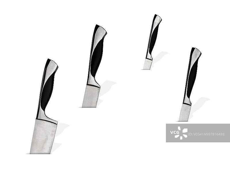 四把插在白色背景上的厨房刀图片素材
