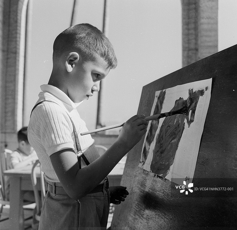 年轻的画家图片素材