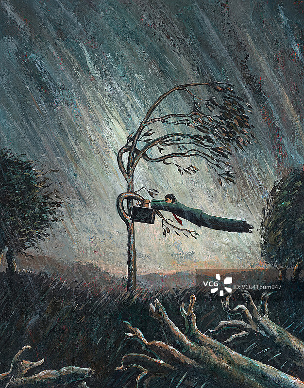 男人在经受风雨图片素材